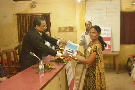 Jhargram Women being handed the curricullum and Letter of Admission